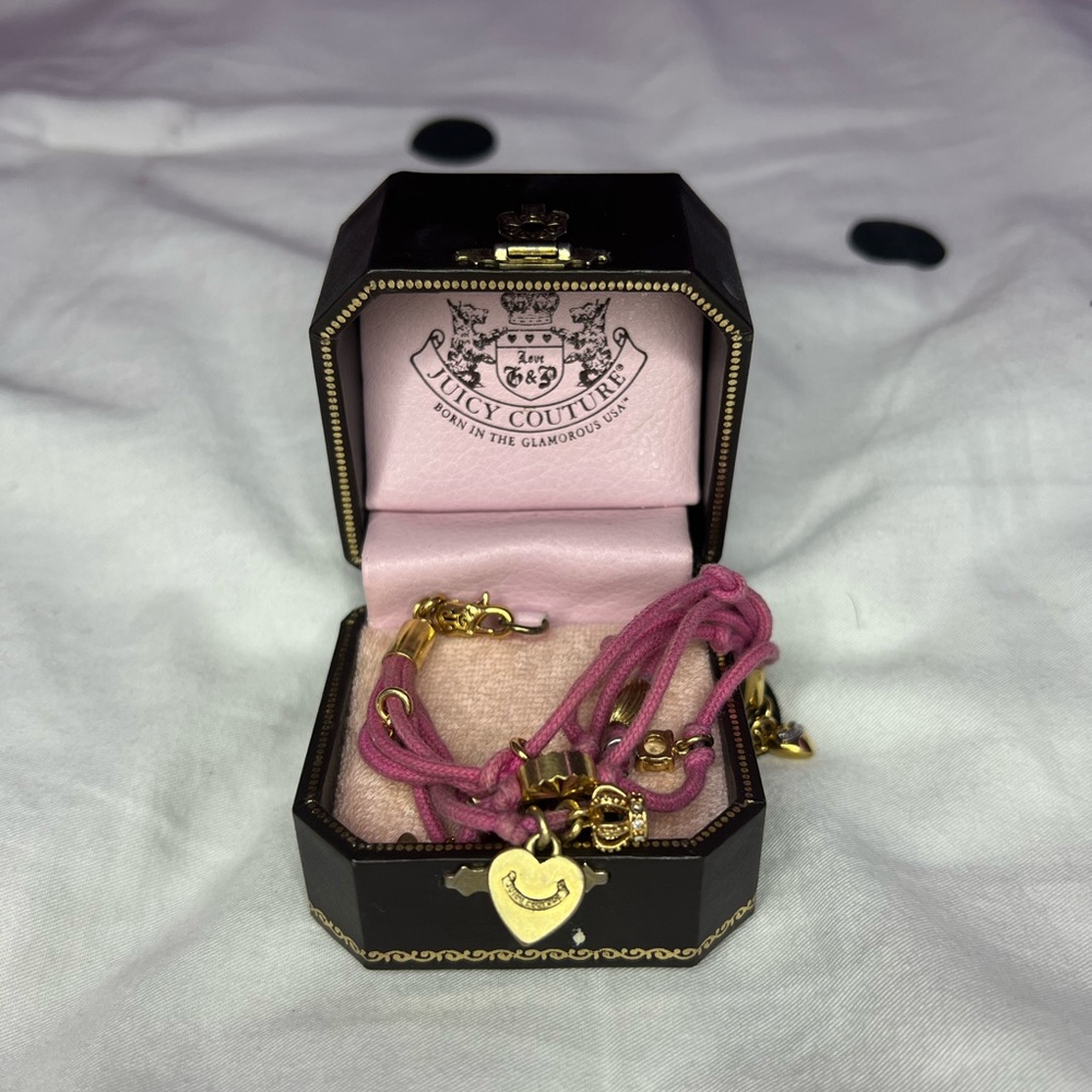 JUICY COUTURE PINK WITH CHARMS BRACELETS